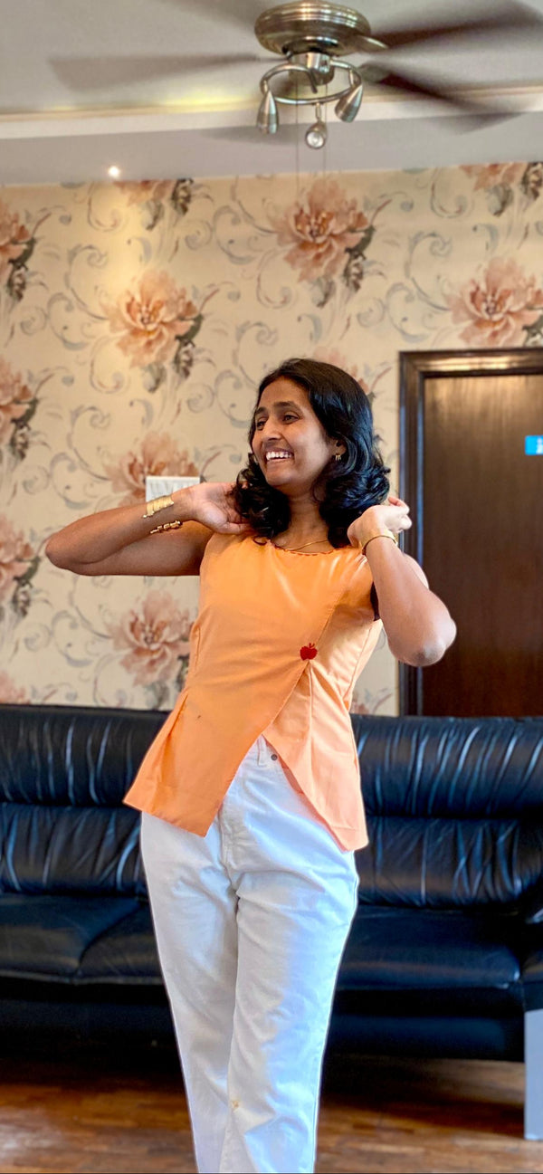 Faint Orange Triangle Slit Top.