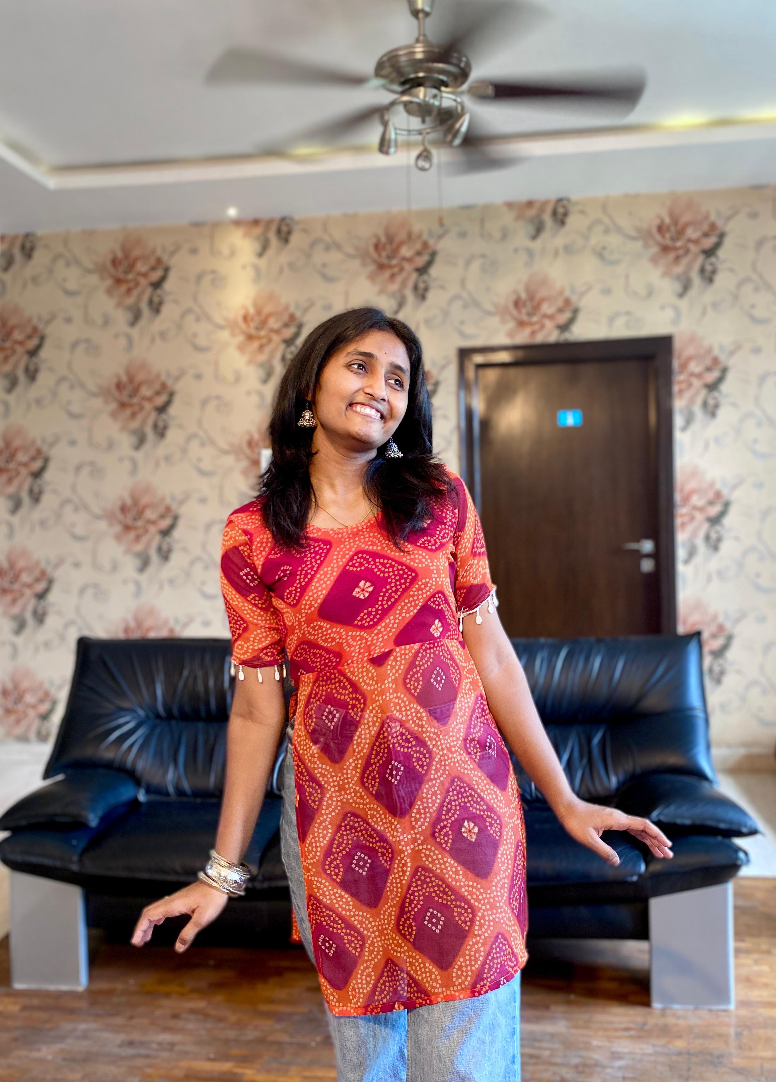 Amber Bloom Bandhani Print Georgette Kurti.