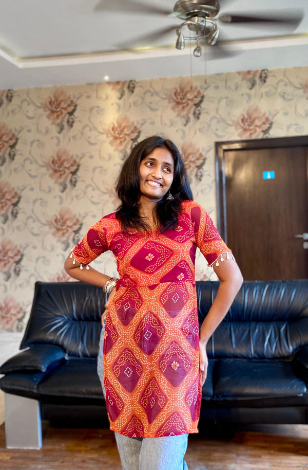 Amber Bloom Bandhani Print Georgette Kurti.